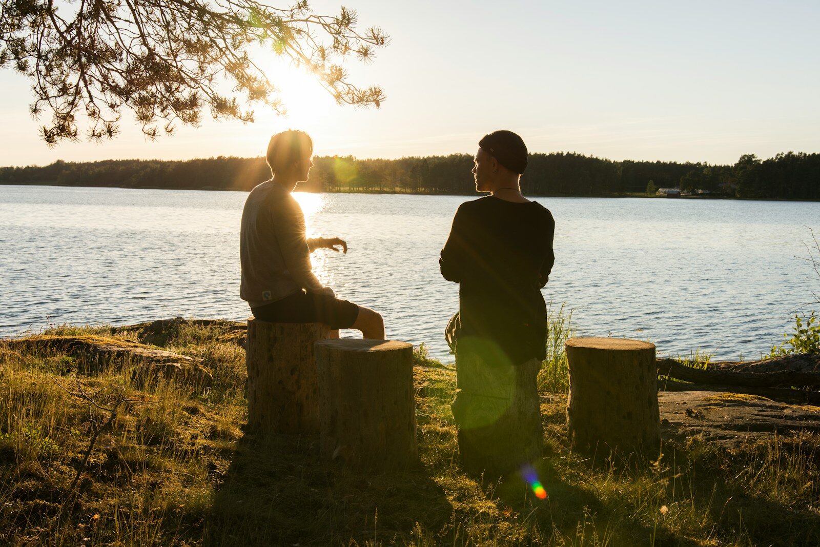 man in black jacket expressing feelings in recovery with a friend