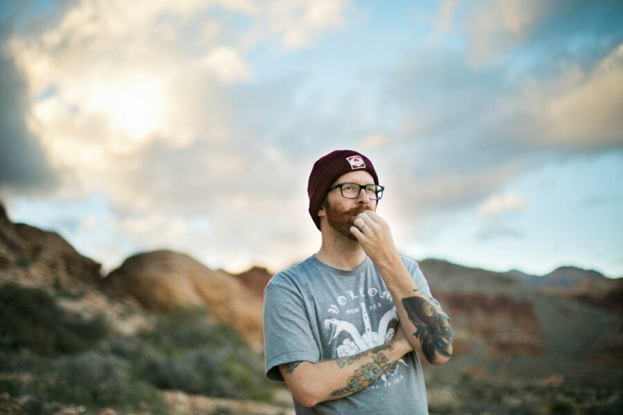 Man in beanie thinking about dry drunk syndrome