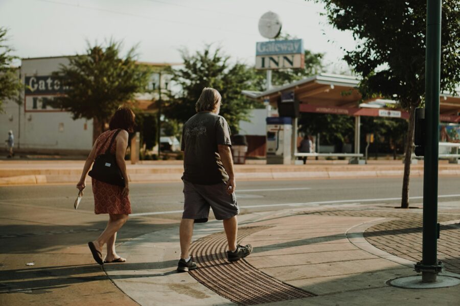 Man and woman having difficult conversations while walking