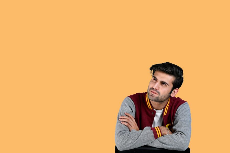 a man with his arms crossed thinking about types of anxiety disorders