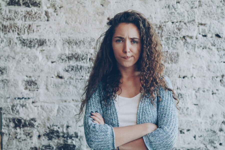 Woman struggling with denial in addiction recovery